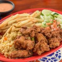 Chicken Wings · Chicken wings, rice, fries and salad.
