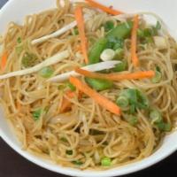 Signature Hakka Noodles · Thin vegetarian noodles with shredded vegetables.