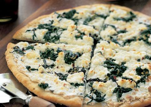 Bianca White Pizza · Spinach, ricotta, roasted garlic and mozzarella cheese.