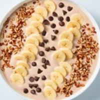 Chocolate Banana Nut Bowl · Sweeten up your day with creamy, chocolate yogurt topped with banana slices, chocolate chips...