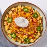 Southwestern Spicy Bowl · Let's spice it up! Seasoned country potatoes, topped with scrambled eggs mixed-in with sauté...
