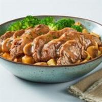Homestyle Pot Roast Bowl · Cuddle up with this comfort food favorite! Seasoned country potatoes smothered with savory p...