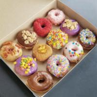 Dozen Baker's Choice Assorted Half Classics and Half Gourmet · Let us pick our favorite donuts. You can also type in  specific donuts and we'll substitute ...
