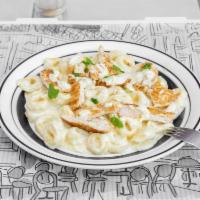 Tortellini Alfredo · Tortellini with creamy Alfredo sauce. Add chicken or shrimp for an additional charge. 