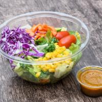 Ginger Salad · Lettuce, tomatoes, carrots, purple cabbage, and corn tossed in a house-made ginger dressing.