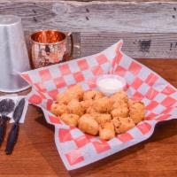 GutterDots · GutterHouse Exclusive! Seasoned cheese dots with monterey jack cheese and served with side o...