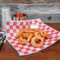 Onion Rings · Mix of crisp and flakey and beer battered onion rings.