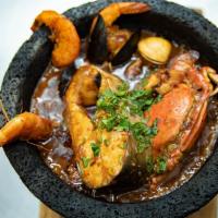 Molcajete de Mariscos          · Coocked Shrimp | Aguachile | Scallops | Octopus | Red Onion | Cucumber | Clamato Juice