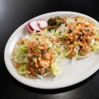 Taco de Pescado · Breaded Tilapia Fish | Bell Pepper | Onion |Lettuce | Pico De Gallo | Chipotle Sauce