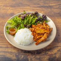 Signature Chicken Teriyaki Plate · Grilled all-natural chicken thigh served over white rice, alongside salad, our house-made se...