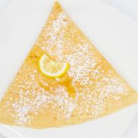 Traditional Sweet Crepe · Crepe with melted butter, fresh squeezed lemon, and powdered sugar.