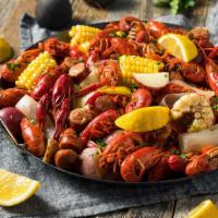 Crawfish Boil - Small · 14-16 crawfish, 7 large shrimp steamed in a cajun butter sauce with corn and potatoes.