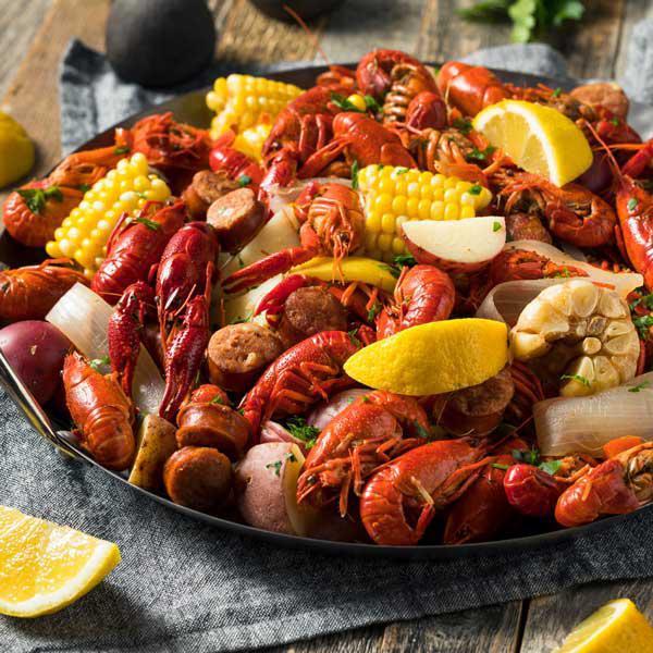 Crawfish Boil - Large · 14-16 large crawfish with 14 large shrimp steamed in a cajun butter sauce with corn and potatoes.