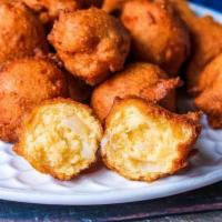 Hushpuppies  · Small, savoury, deep-fried round ball made from cornmeal-based batter.