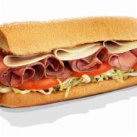 Roast Beef · Top round Roasted Beef, Lettuce, Tomato, Onion, Swiss Cheese, Mustard & House Spicy Mayo