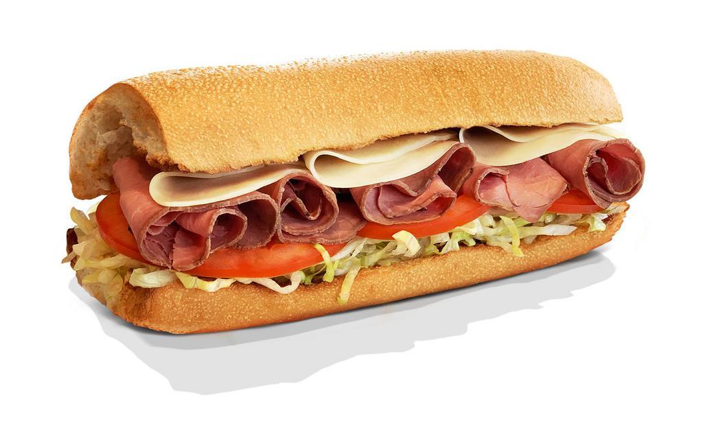 Roast Beef · Top round Roasted Beef, Lettuce, Tomato, Onion, Swiss Cheese, Mustard & House Spicy Mayo