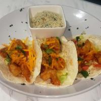 3 Piece Shrimp Taco · Battered, fried and tossed in jason’s secret sauce, tomato, lettuce and cilantro lime rice.
