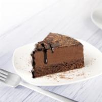 Triple Chocolate Cake · Fresh slice of rriple chocolate cake.