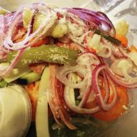 Antipasto Salad · Iceberg lettuce, red onions, mortadella, fresh tomatoes, salami, provolone, and Romano cheese.