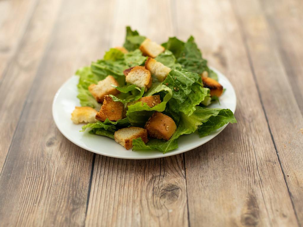 Caesar Salad · Creamy Caesar dressing and flavorful croutons to please the entire crowd. 