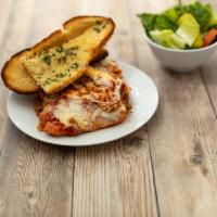 Lasagna · Lasagna topped with classic cheese, tomato sauce, and ground beef. 