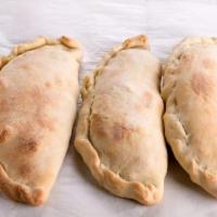 Ham Calzone · Made with ricotta, provolone, and mozzarella cheese.