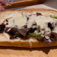 Philly Steak Sandwich · Mushrooms, bell peppers, onions, and provolone cheese.