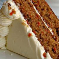 Carrot Cake · Moist cake, spiced with cinnamon, and frosted with cream cheese frosting. 