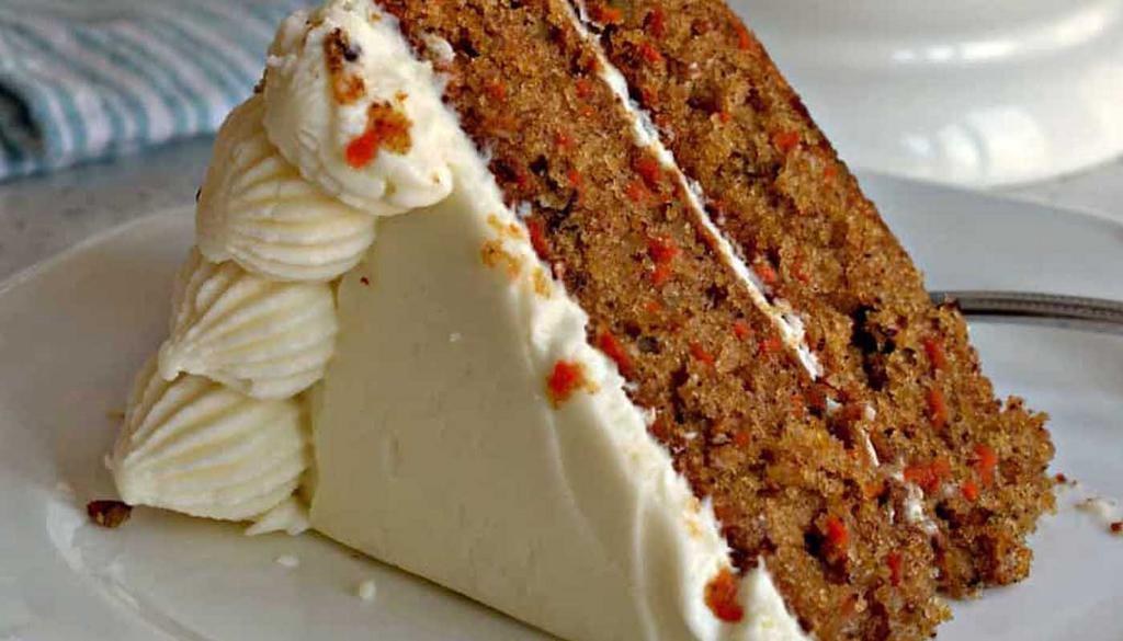 Carrot Cake · Moist cake, spiced with cinnamon, and frosted with cream cheese frosting. 