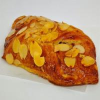 Almond Croissant · A flaky French pastry.