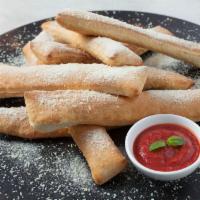 Breadsticks · 8 piece breadsticks plus a side of Marinara sauce.