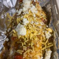 Burrito · Smothered in Green chili with cheese. 
 beans cheese and your choice of meat. 