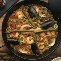 Para 2 Arroz Del Mediterraneo · For 2. Spanish rice, shrimp, squid, clams, mussels, homemade octopus sauce. Arroz espanol, c...