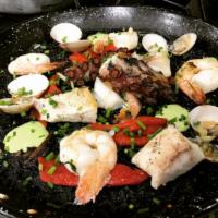 Para 2 Arroz Negro · For 2. Spanish rice, shrimp, squid, octopus, squid sauce, homemade octopus sauce. Arroz espa...