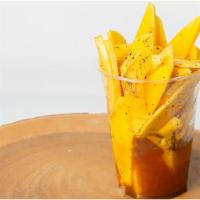 Flavor Explosion Mango · Mango slices, vinegar, salt, pepper, seasoning salt.