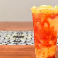 Mangonada Drink · Enjoy our large 24oz. Of mangonada drink, fresh mango juice, chamoy, tajin, fresh lime juice...