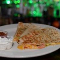 Grilled Quesadilla · Onion, jalapeno, tomato. Add meat for an additional charge.