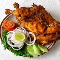 Tandoori (Half Chicken) · Half chicken marinated in yogurt, house spices and cooked in a clay oven. 