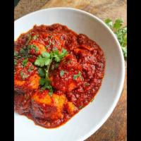 Fish Masala · Fish boneless cooked in mildly seasoned masala sauce. Served with rice.