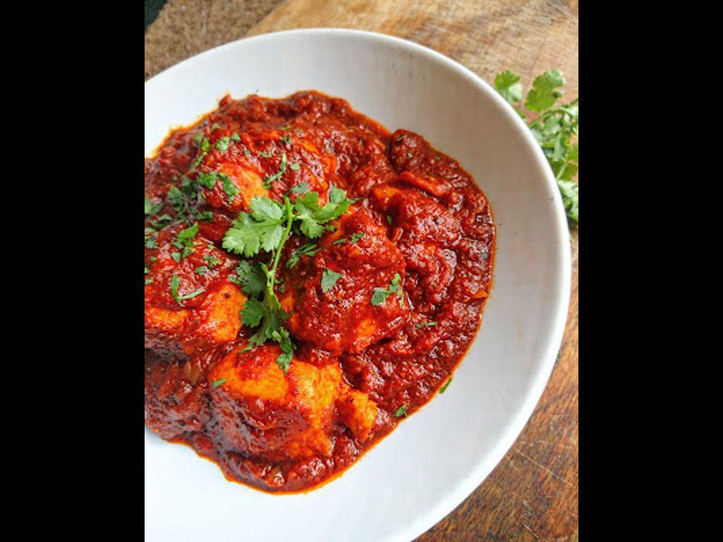 Fish Masala · Fish boneless cooked in mildly seasoned masala sauce. Served with rice.