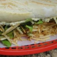 Sandwich de Pollo Peruano  · Chicken salad, shoestring fries and lettuce on a baguette.