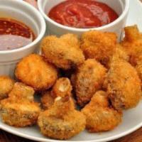 Breaded Mushrooms · Served with ranch sauce.