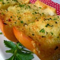 Garlic Bread ·  Buttery bread that is topped with garlic. 