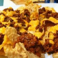Nachos with Chili and Cheese · Add jalapeno for an additional charge.