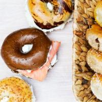 2 Nova Salmon and Cream Cheese Bagel Sandwiches · Boiled and baked round bread roll.
