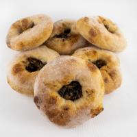 Dozen Bialys (12) · 12 savory bread roll filled with a distinctive onion and poppy seed mixture.