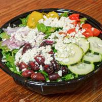 The Greek Salad · Lettuce, cucumbers, tomatoes, red onions, pepperoncini, olives, feta, and your choice of dre...