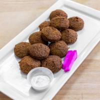 Dozen Falafel · 12 deep-fried balls made from chickpeas, includes our signature tahini sauce.