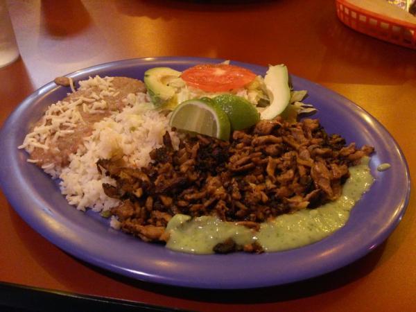 15. Carnitas Plate · Moist and crunchy flavored pork. Includes rice, beans, corn tortillas, avocado, tomato and lettuce.