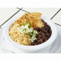 Rice & Beans · Traditional Mexican arroz verde cooked with epazote, an aromatic Mexican herb.